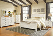 Willowton Queen Panel Bed with Mirrored Dresser, Chest and Nightstand Huntsville Furniture Outlet