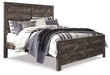 Wynnlow King Crossbuck Panel Bed with Mirrored Dresser, Chest and 2 Nightstands Huntsville Furniture Outlet