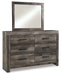 Wynnlow King Crossbuck Panel Bed with Mirrored Dresser, Chest and 2 Nightstands Huntsville Furniture Outlet