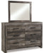 Wynnlow King Crossbuck Panel Bed with Mirrored Dresser Huntsville Furniture Outlet