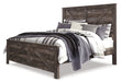 Wynnlow King Crossbuck Panel Bed with Mirrored Dresser Huntsville Furniture Outlet