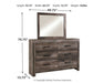 Wynnlow King Crossbuck Panel Bed with Mirrored Dresser Huntsville Furniture Outlet