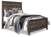 Wynnlow Queen Crossbuck Panel Bed with Mirrored Dresser, Chest and 2 Nightstands Huntsville Furniture Outlet