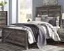 Wynnlow Queen Crossbuck Panel Bed with Mirrored Dresser, Chest and Nightstand Huntsville Furniture Outlet