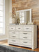 Bellaby Queen Crossbuck Panel Bed with Mirrored Dresser Huntsville Furniture Outlet