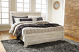 Bellaby Queen Panel Bed with Mirrored Dresser and Chest Huntsville Furniture Outlet