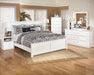 Bostwick Shoals King Panel Bed with Mirrored Dresser, Chest and Nightstand Huntsville Furniture Outlet