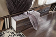 Drystan King Panel Bed with Mirrored Dresser, Chest and 2 Nightstands Huntsville Furniture Outlet