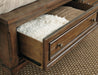 Flynnter Queen Panel Bed with 2 Storage Drawers with Dresser Huntsville Furniture Outlet