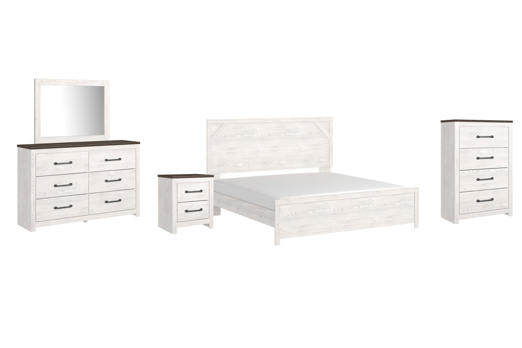 Gerridan King Panel Bed with Mirrored Dresser, Chest and Nightstand Huntsville Furniture Outlet