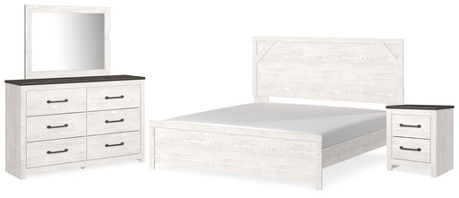 Gerridan King Panel Bed with Mirrored Dresser and Nightstand Huntsville Furniture Outlet