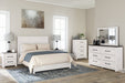 Gerridan Queen Panel Bed with Mirrored Dresser, Chest and 2 Nightstands Huntsville Furniture Outlet