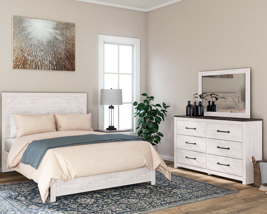 Gerridan Queen Panel Bed with Mirrored Dresser Huntsville Furniture Outlet