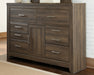 Juararo California King Poster Bed with Dresser Huntsville Furniture Outlet