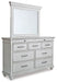 Kanwyn King Panel Bed with Mirrored Dresser Huntsville Furniture Outlet