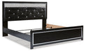 Kaydell King Upholstered Panel Bed with Mirrored Dresser and Chest Huntsville Furniture Outlet