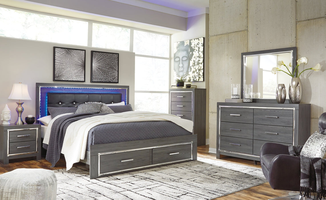 Lodanna King Panel Bed with 2 Storage Drawers with Mirrored Dresser, Chest and Nightstand Huntsville Furniture Outlet