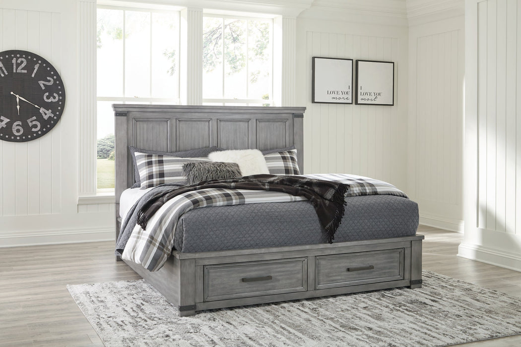 Russelyn King Storage Bed with Mirrored Dresser and Chest Huntsville Furniture Outlet