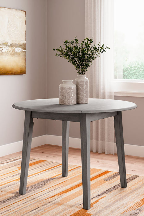 Shullden Round DRM Drop Leaf Table Huntsville Furniture Outlet